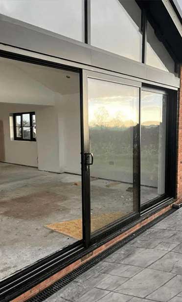 black aluminium patio sliding doors